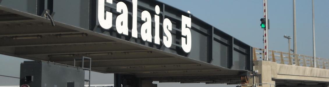 image of vehicles boarding freight ferry at calais
